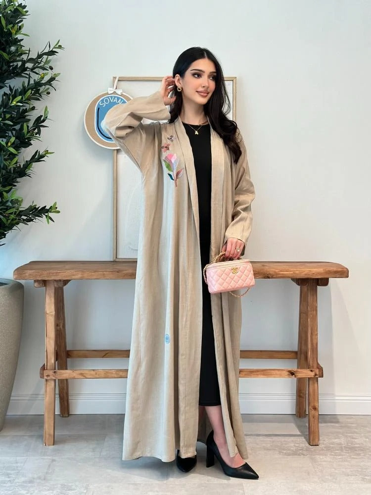 Luxurious beige linen abaya with elegant embroidery on the shoulder, front and back