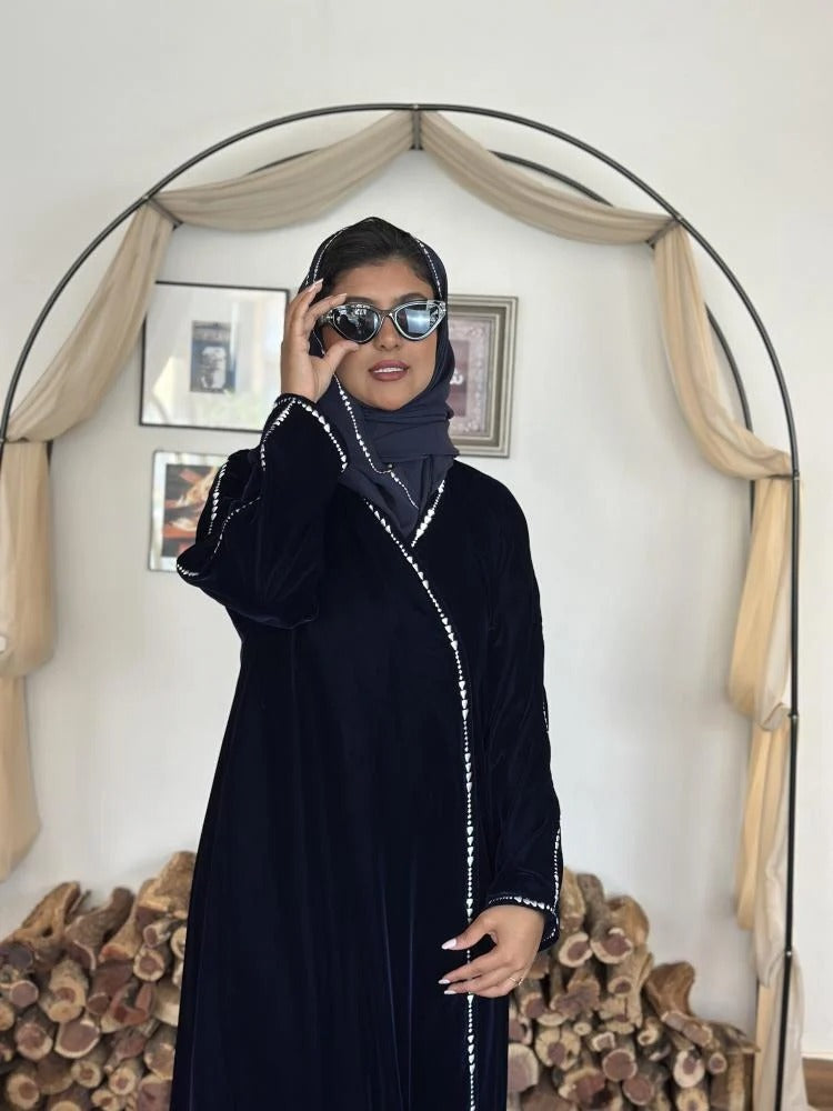 Navy blue winter velvet abaya decorated with luxurious silver embroidery