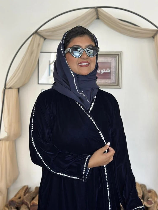 Navy blue winter velvet abaya decorated with luxurious silver embroidery